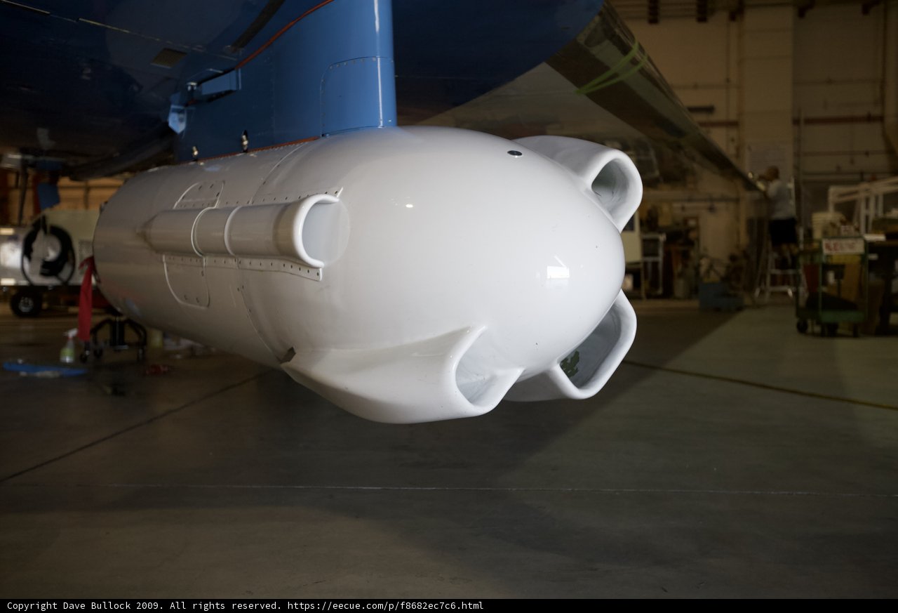 Close Up of an Airplane with a Mysterious Object