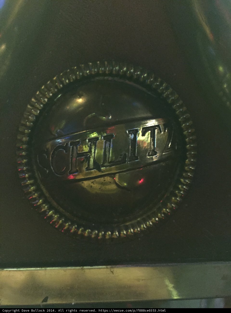 Metallic Logo Badge on Automotive Wheel