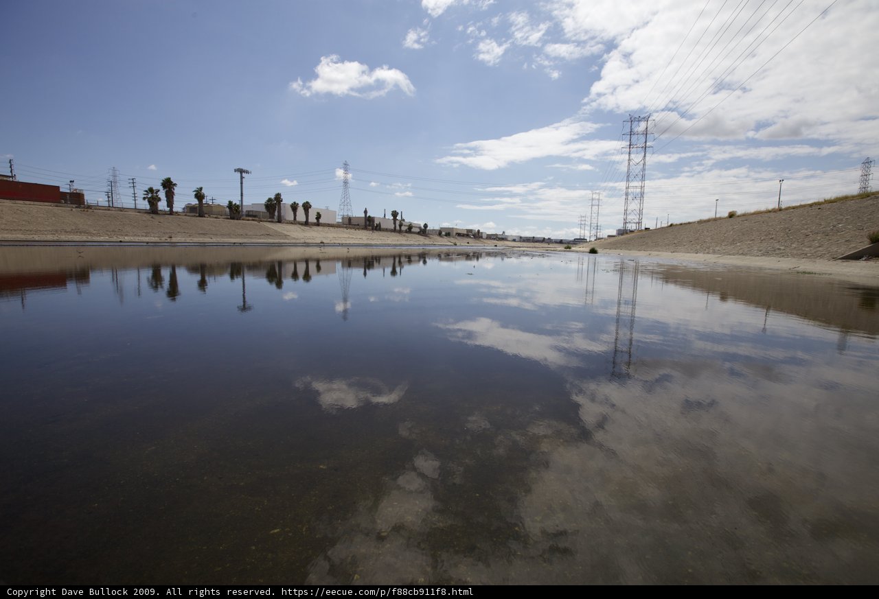 Power Lines Over a Serene River