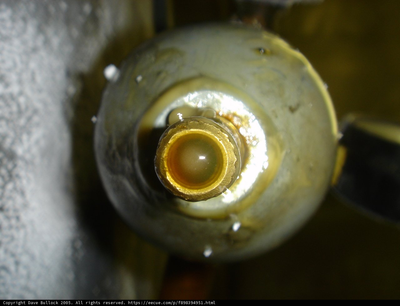 Yellow Water Flowing Through a Pipe