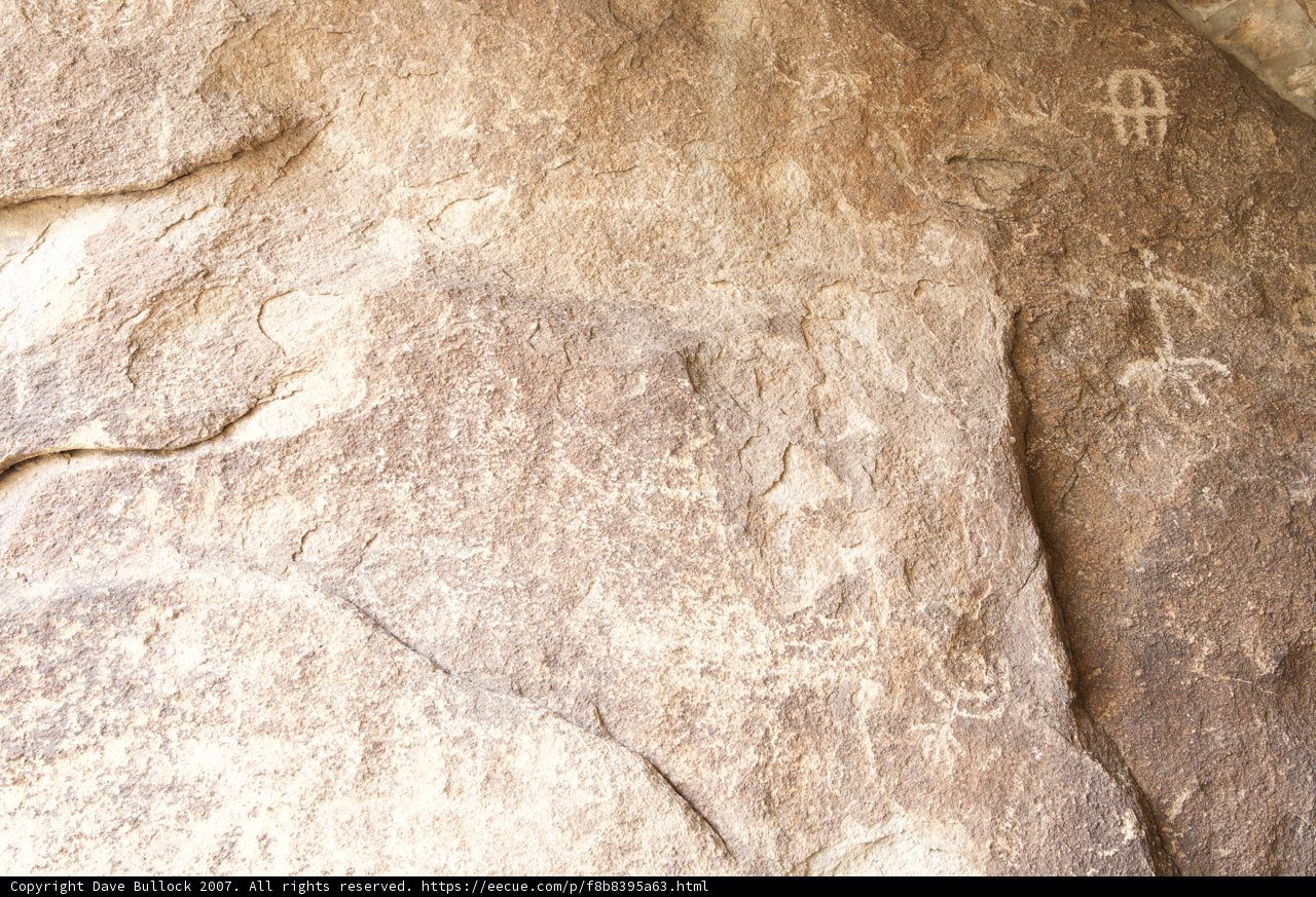 Ancient Carvings on a Rocky Slate