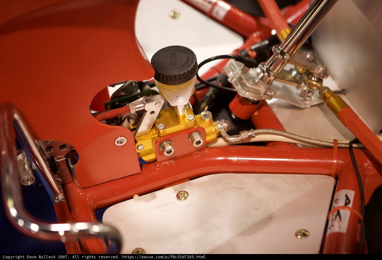 The Engine of a Red and White Motorcycle