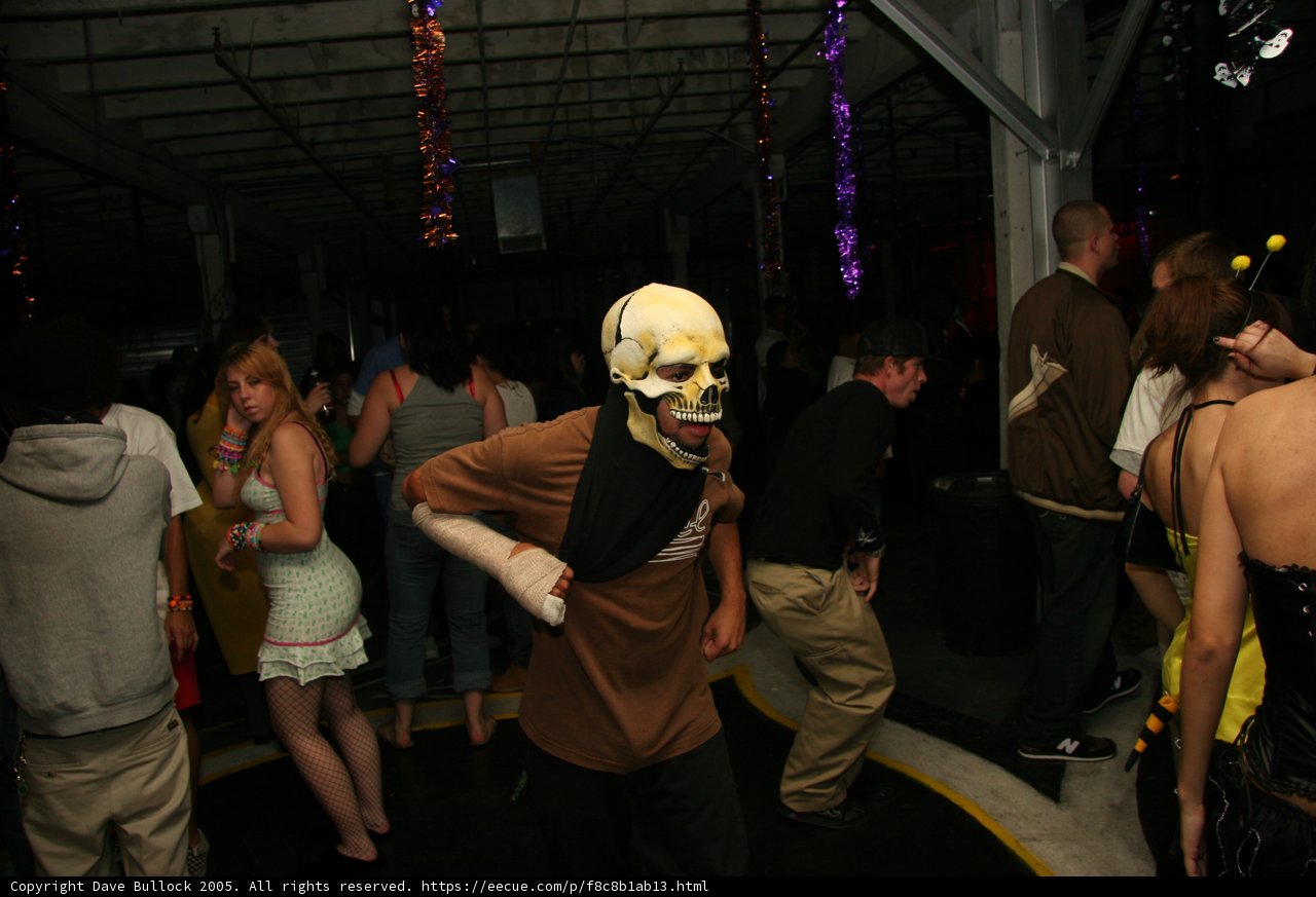 Skull Masked Man in Urban Night Life