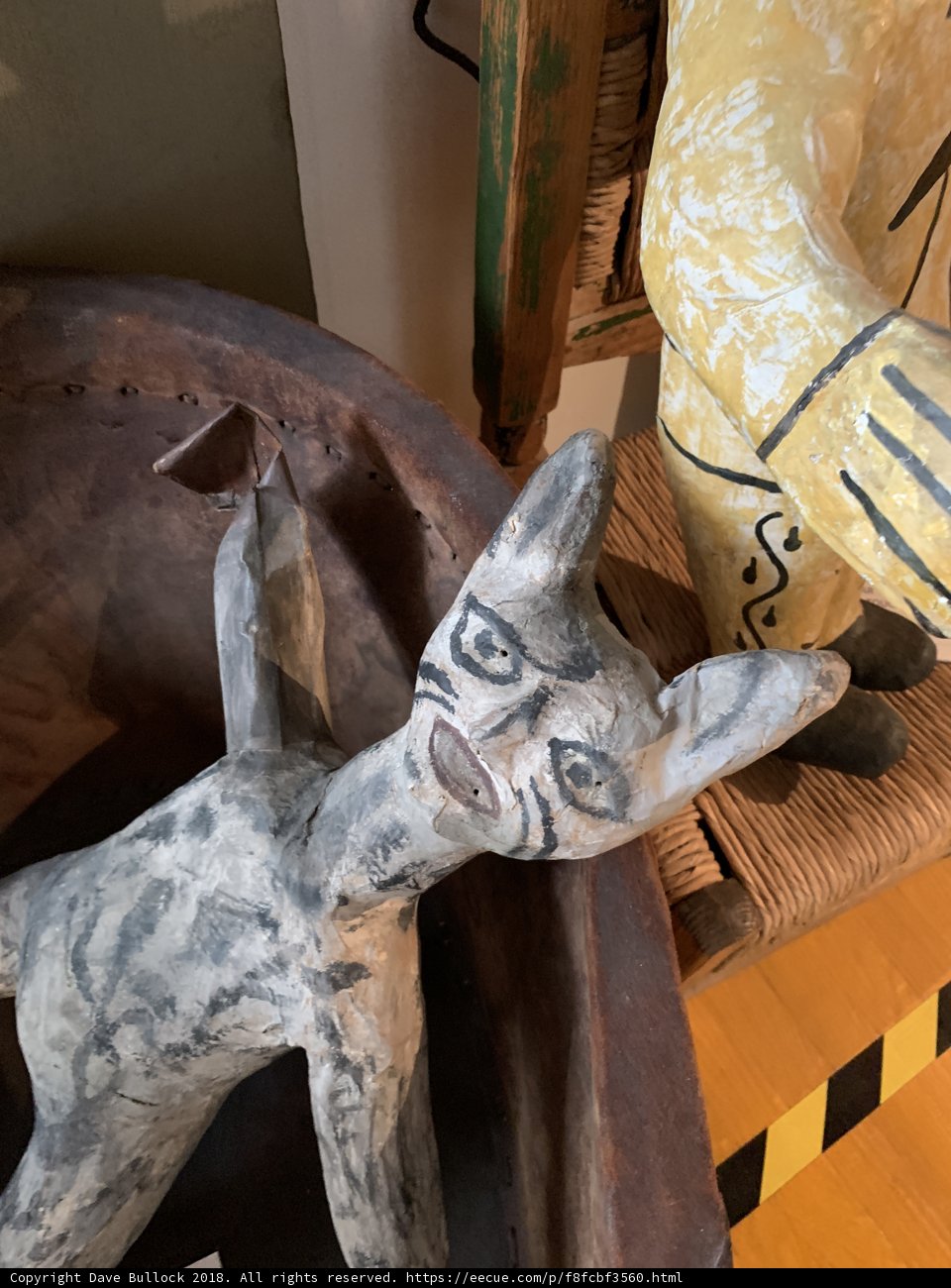 Wooden Sculpture of a Cat in a Bowl