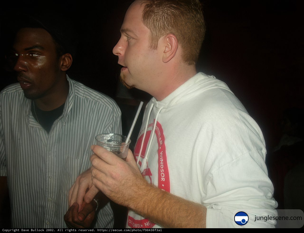 Two Men in Formal Wear at a Party