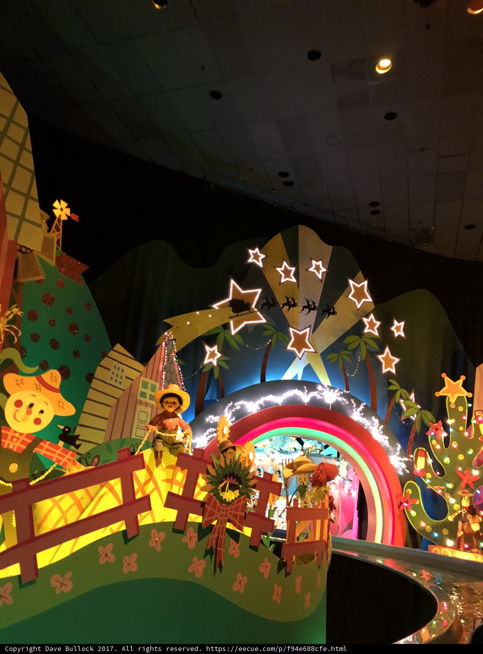 Eloise Wilkin and Baby Enjoy the Festive Atmosphere at Disneyland's Holiday Village