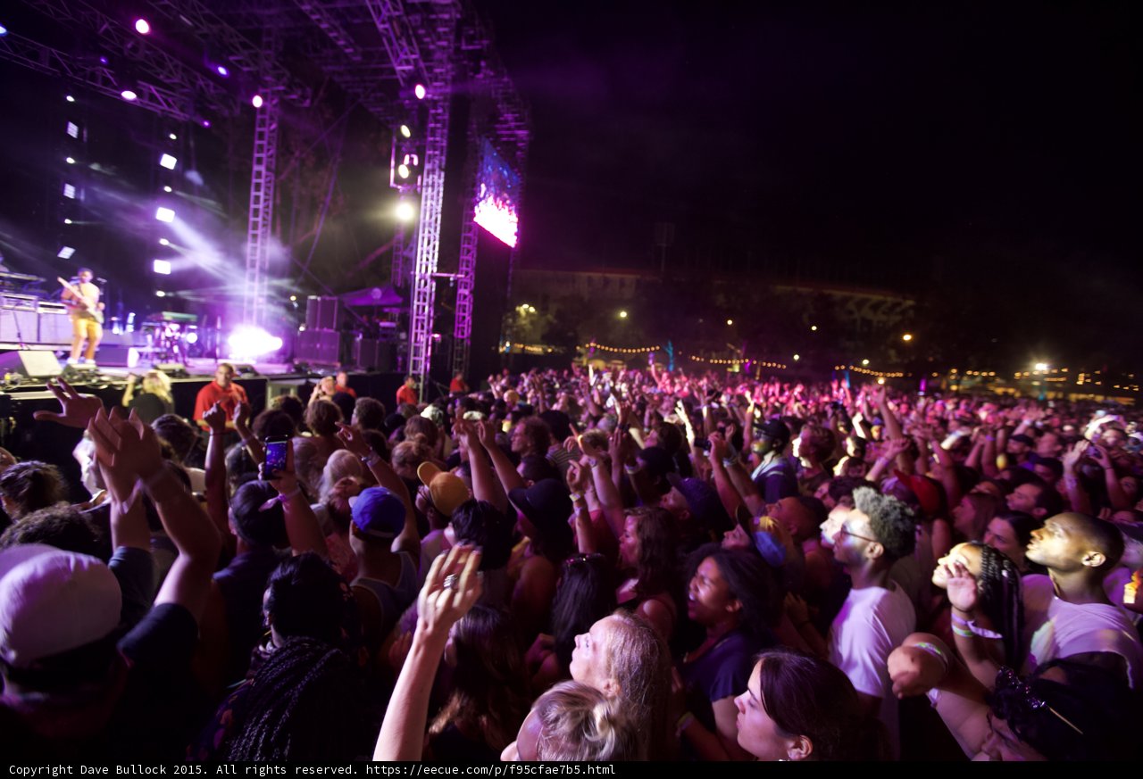 FYF Fest Wide Crowd Shot Stage Guitarist Video Screen Arms Raised Purple Night