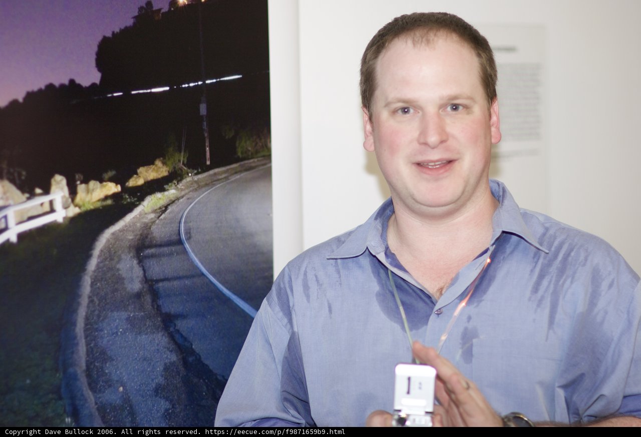 Man with Remote Control and Picture
