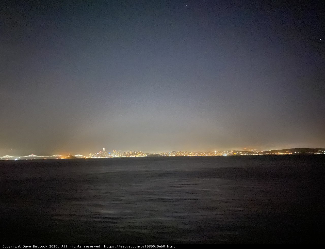 Skyline at Night with Rainbow over San Francisco Bay