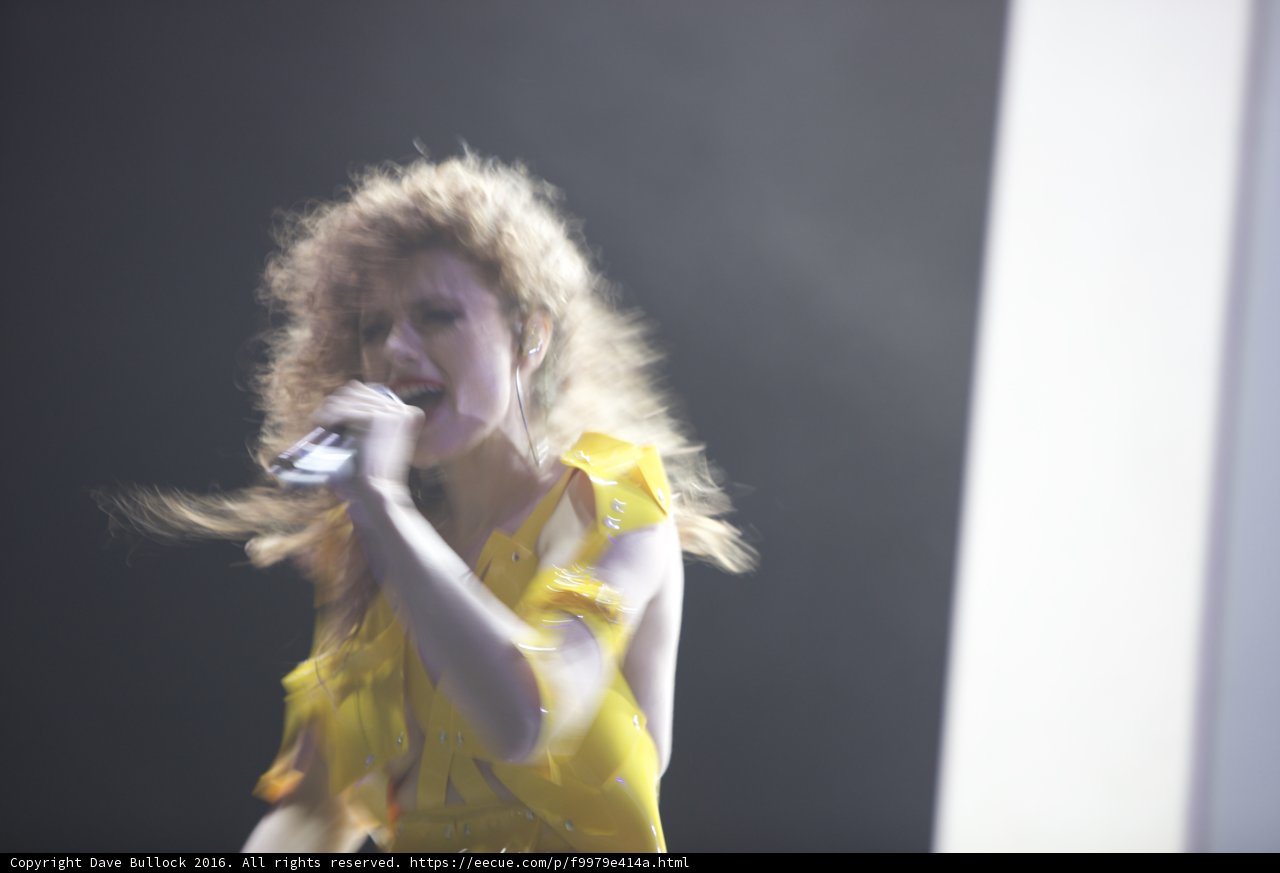 Yellow-Dressed Woman Shines on Coachella Stage