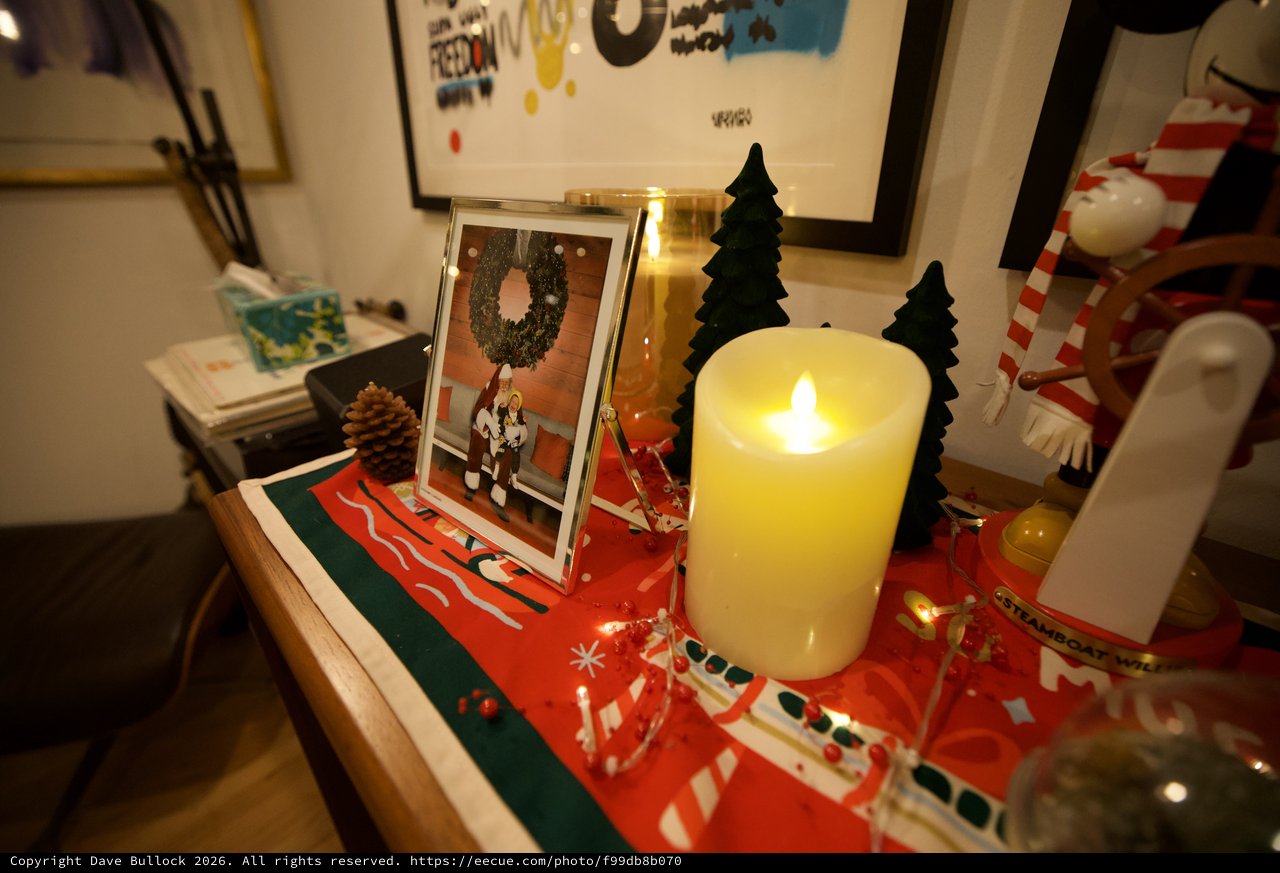 Cozy Christmas Display with LED Candle and Family Photo