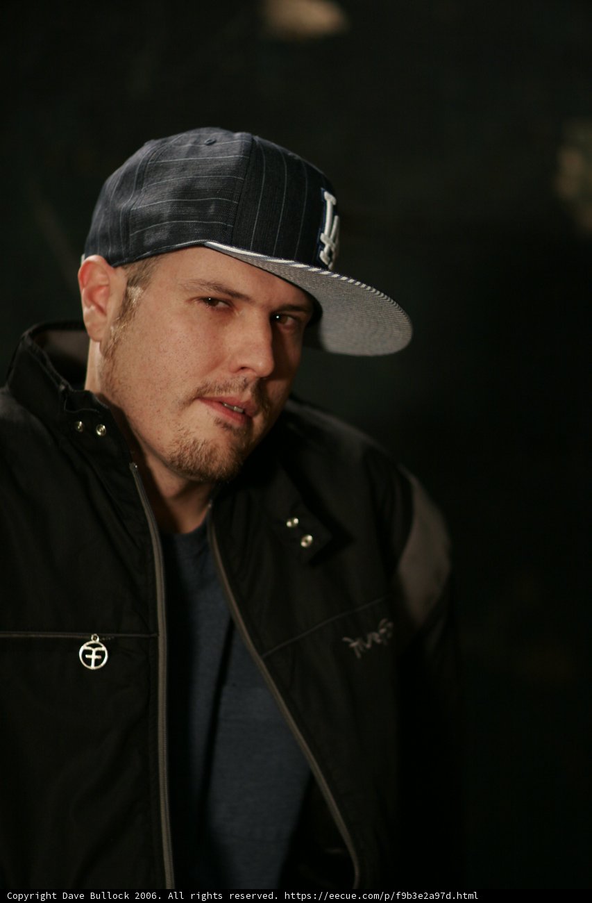 Man in Jacket and Baseball Cap