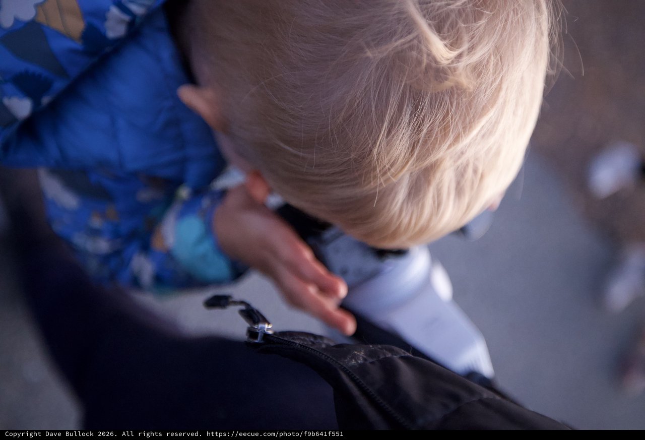 Curious Toddler Explores Zipper on Camping Gear