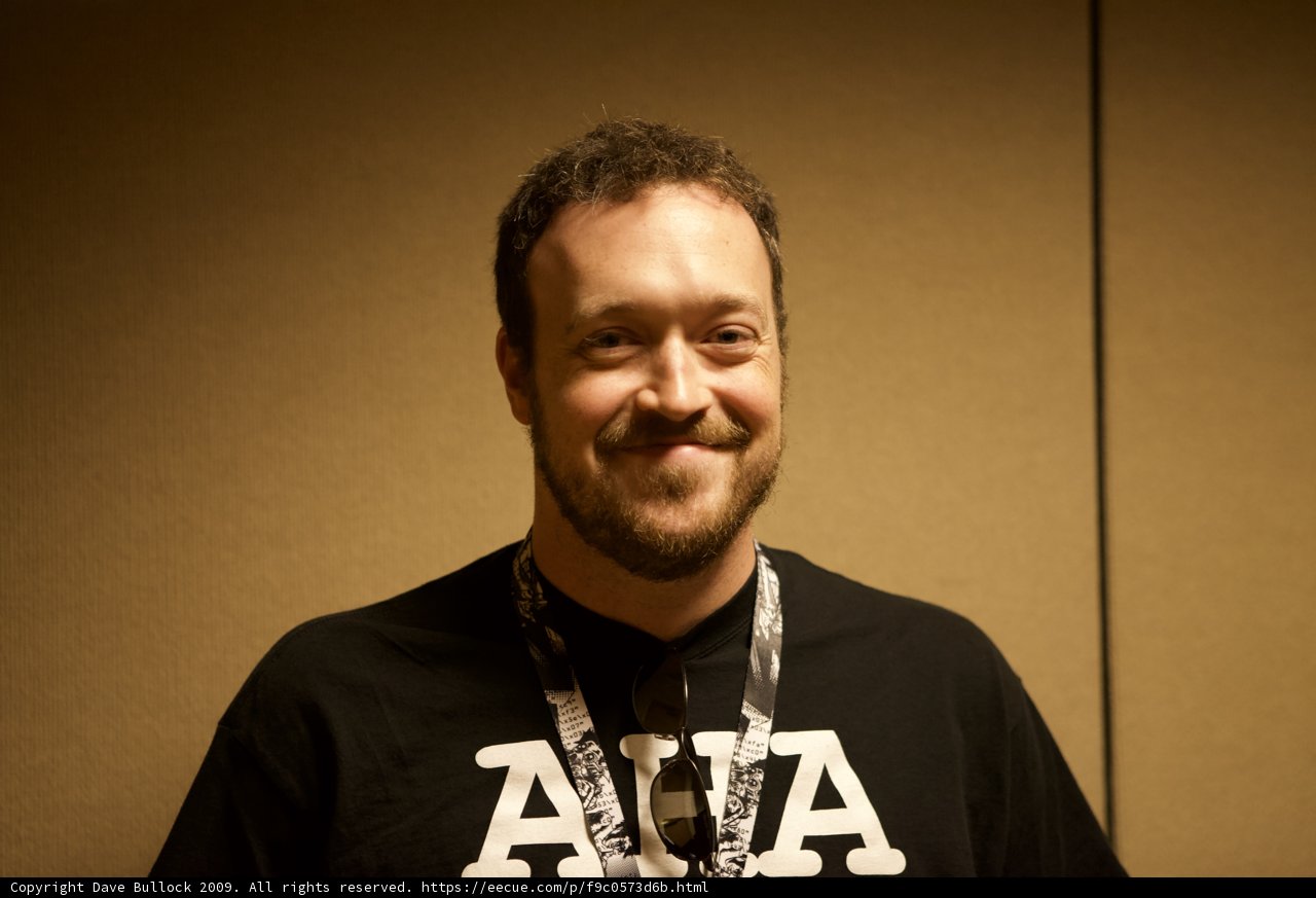Happy Man with a Beard and Black T-Shirt