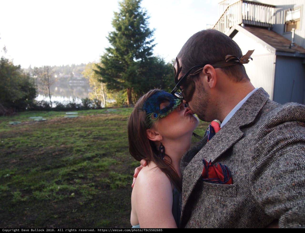 Masked Kiss at Lakeside Masquerade Party