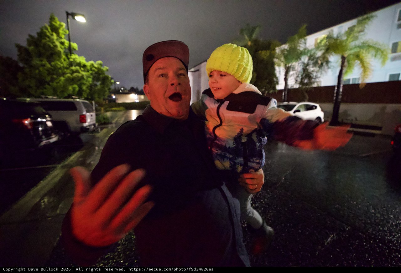 Father and Child Caught in Moment of Surprise