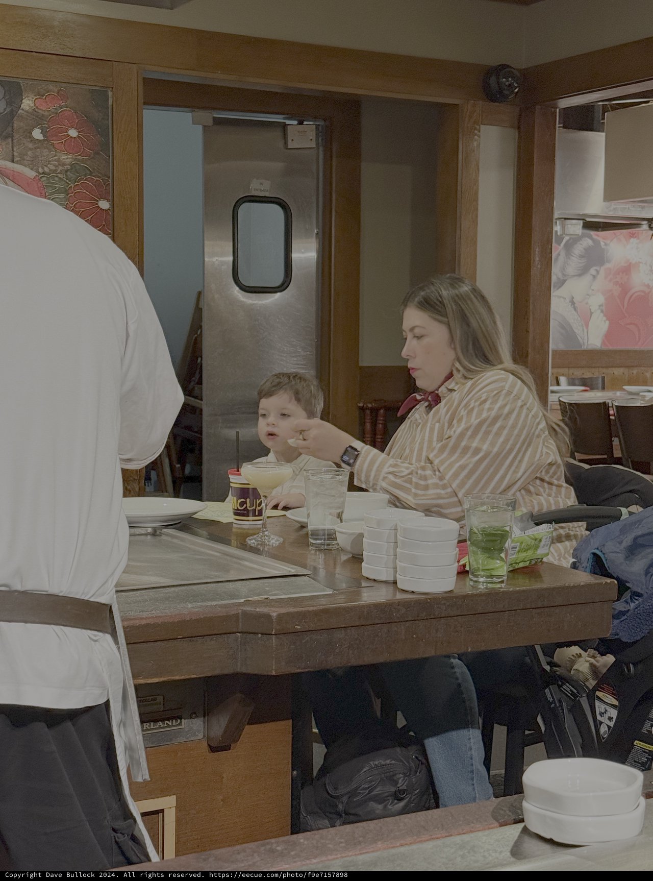 Mother and Child Dining in Japanese Restaurant