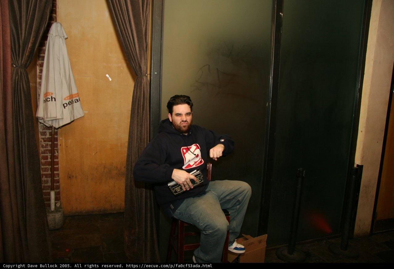A Man Sitting by the Door