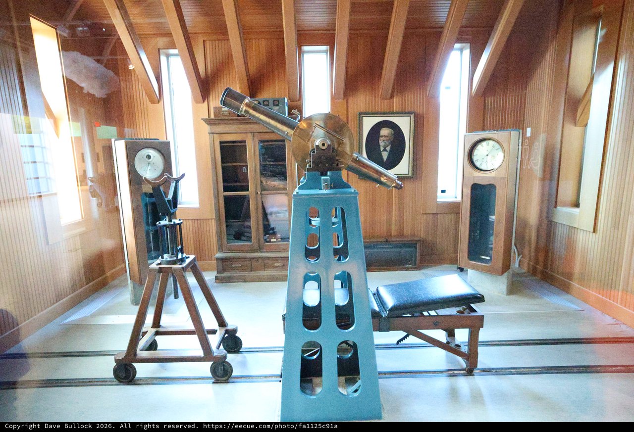 Vintage Astronomical Observatory Interior with Historic Telescope