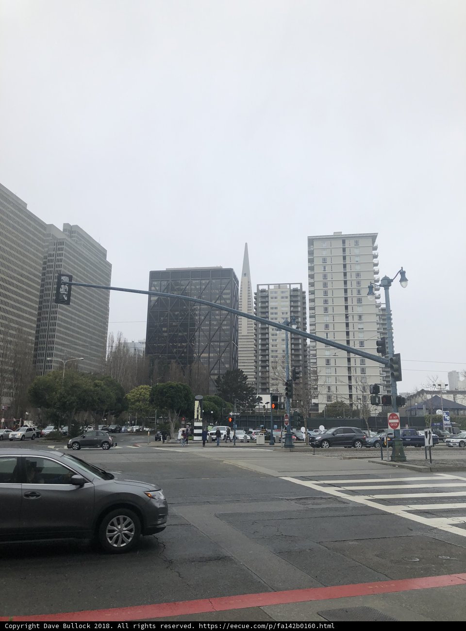 City Intersection with Traffic Light and Office Building