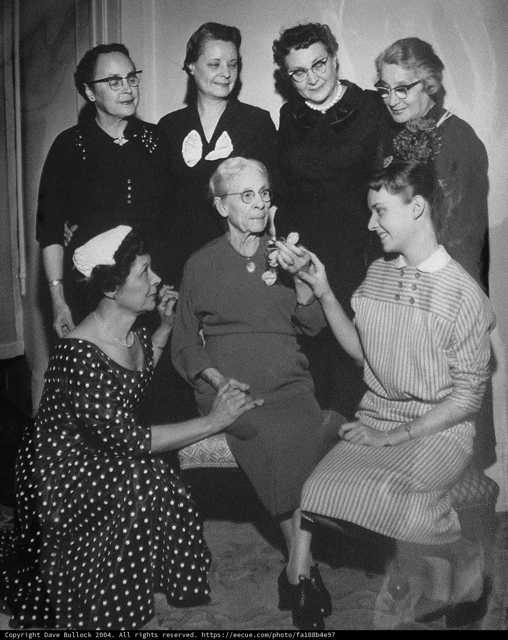 A Group of Women in Polka Dot Dresses and Hats