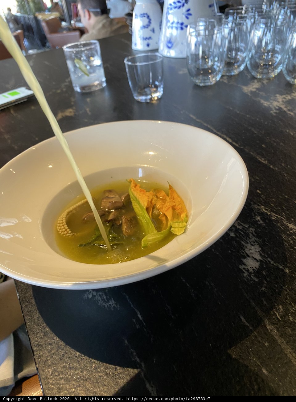 Comforting Soup on a White Plate