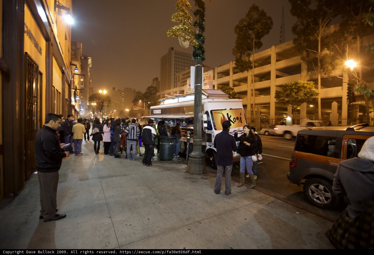 Hungry Crowd Gathers At Night