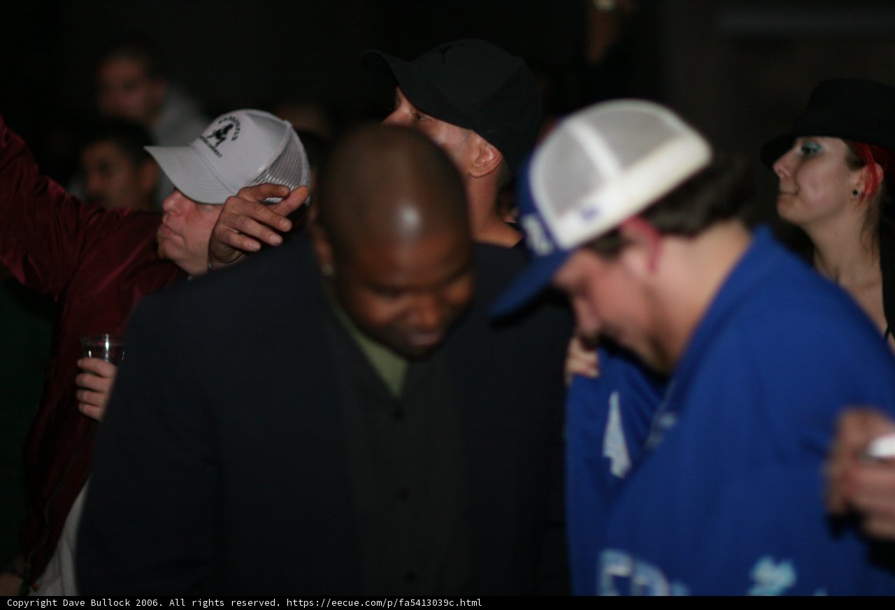 Hat-wearing man at party