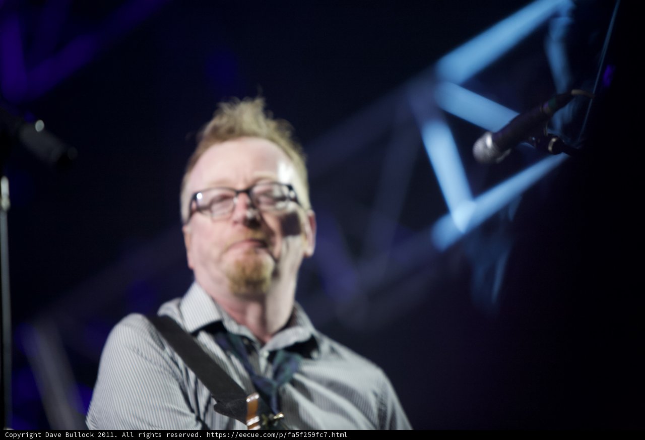 The Guitarist in Glasses