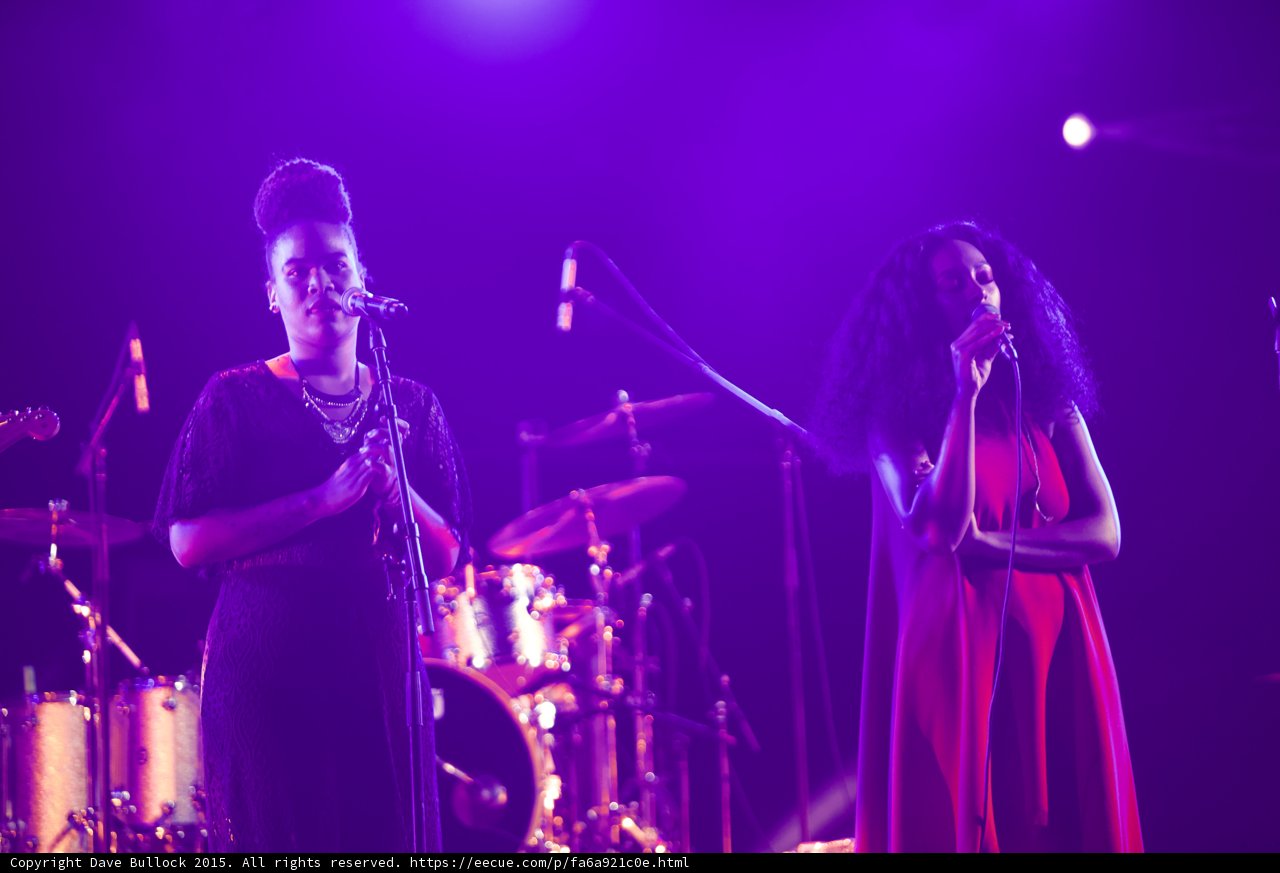 Solange And Backing Vocalist Both Singing Drum Kit Spotlight Purple Haze
