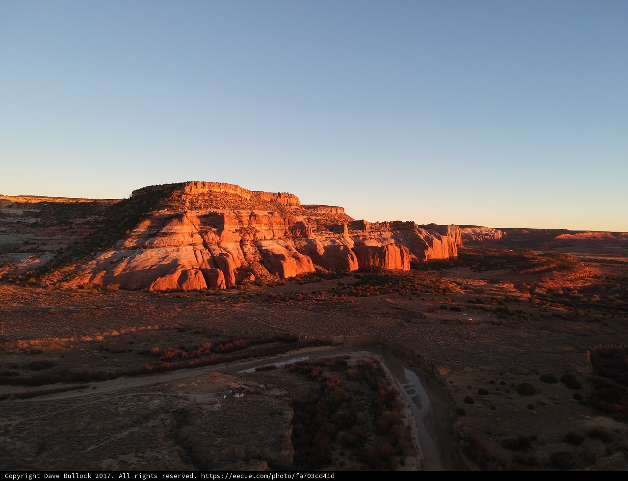 Red Rocks and Mesas at Sunset