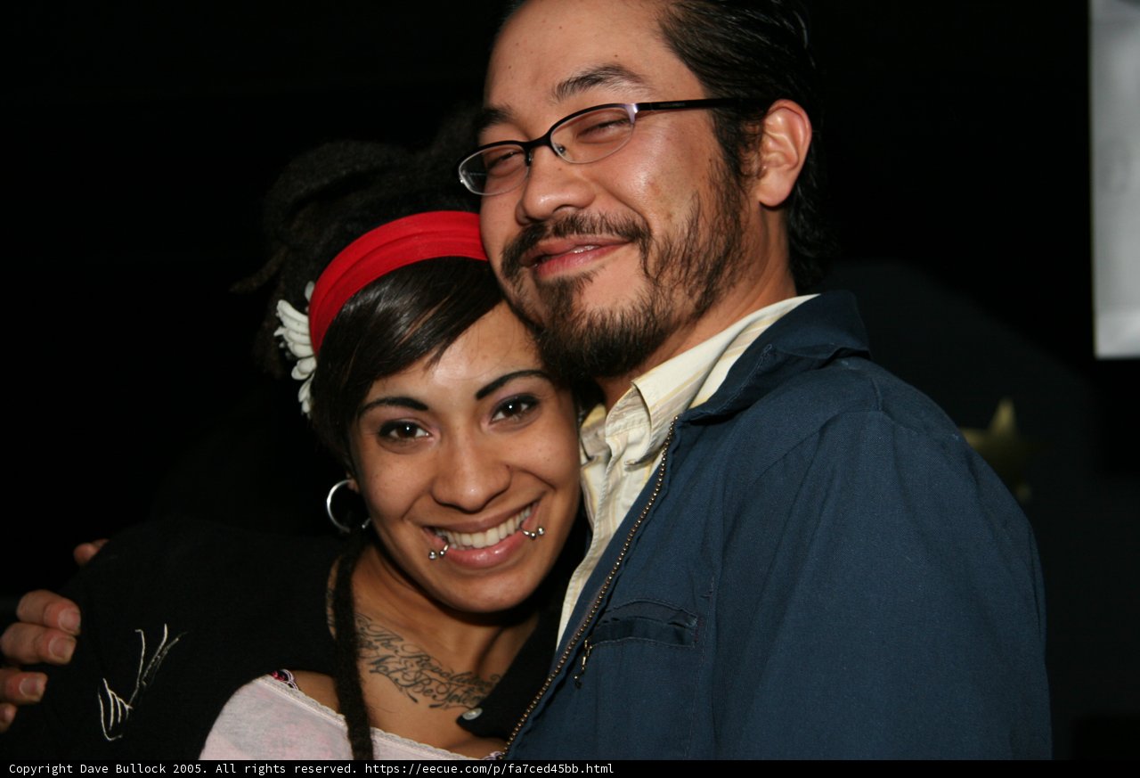 A Happy Couple Strikes A Pose