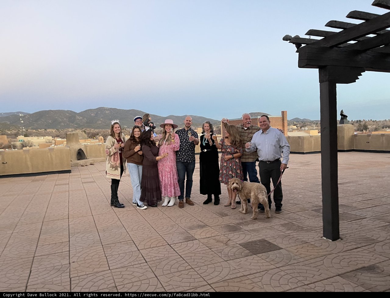 Friends and Furry Companion on Santa Fe Rooftop