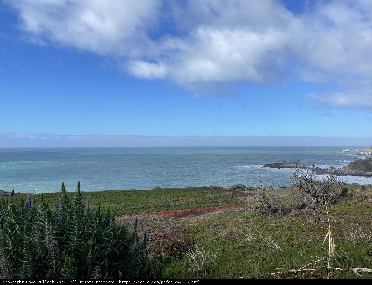 A Breathtaking View of the Pacific Ocean and Hills