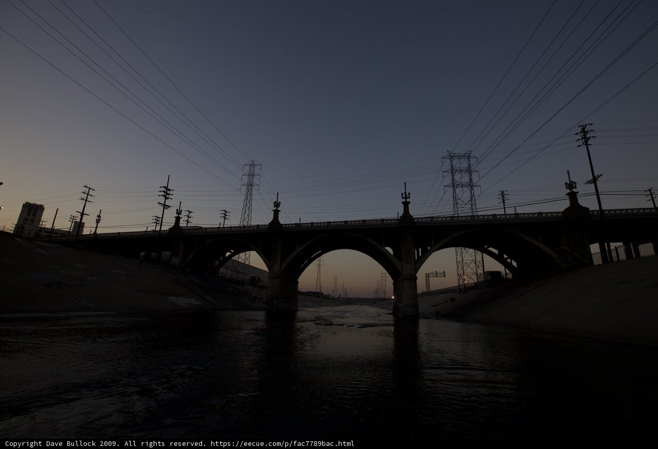 Sunset Silhouette: The Arch and Power Lines
