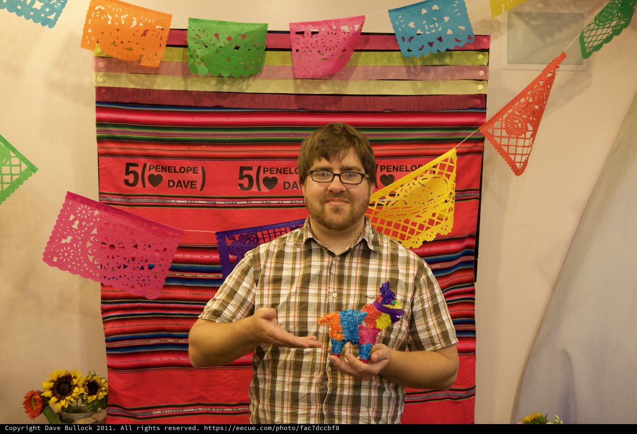 Dave Holds Mini Piñata at Five-Year Anniversary Fiesta