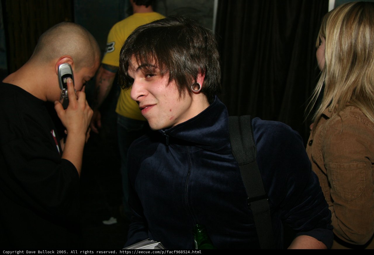 Chris K Performing with Microphone in Hand