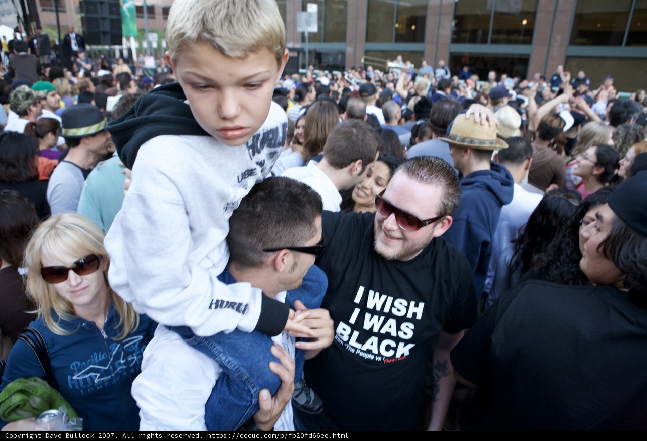 Father and Son in the Heart of the Crowd