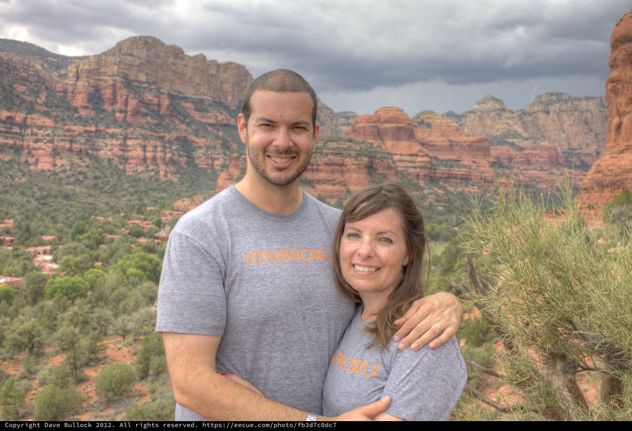 Couple Smiling Against Sedona Red Rock Backdrop