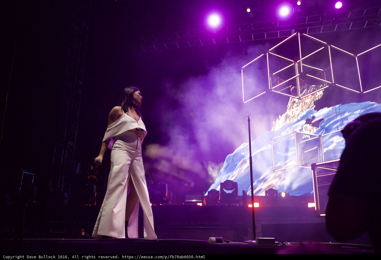 Solo Performance on a Spotlighted Stage