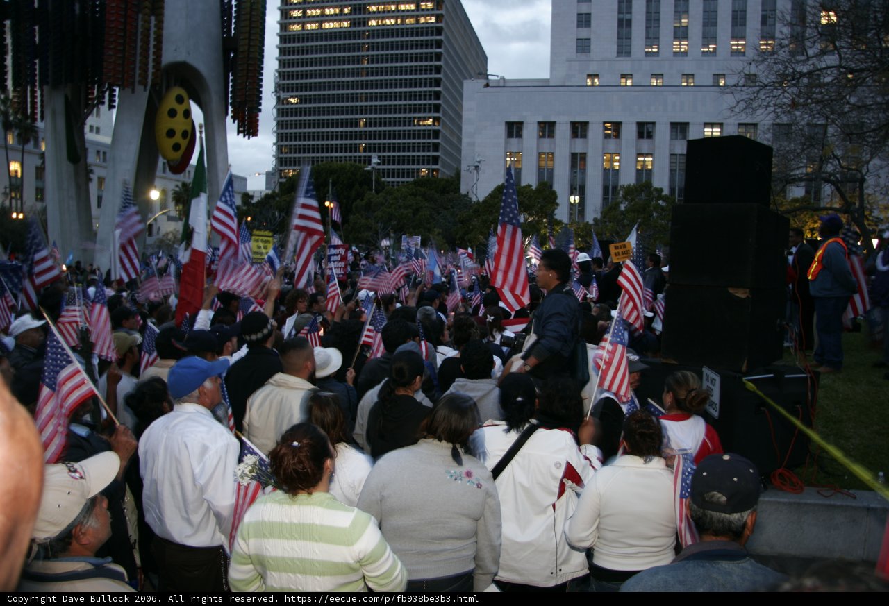 Patriotic Crowd in Front of Office Building