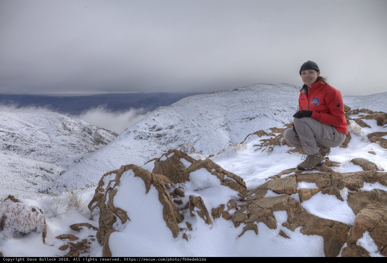 Mountain Summit Triumph Above Winter Cloud Layer