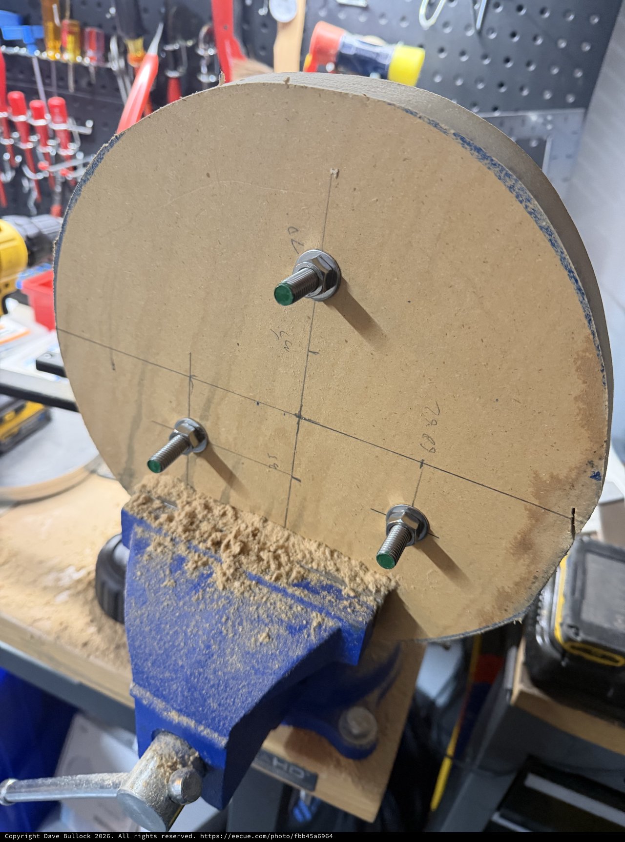 Cardboard Disc Mounted in Workshop Vice for DIY Project