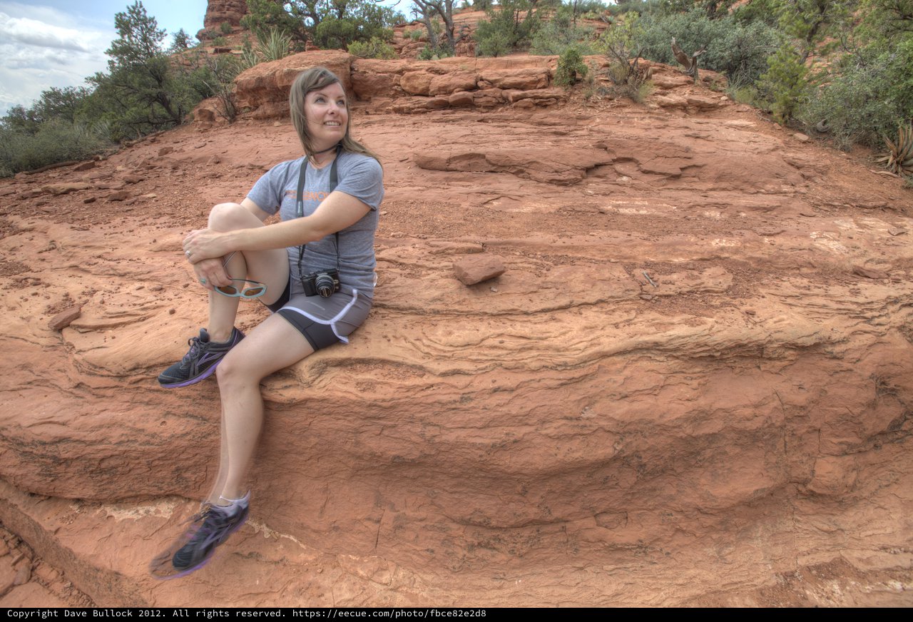 Hiker Resting on Red Rock Formations in Sedona