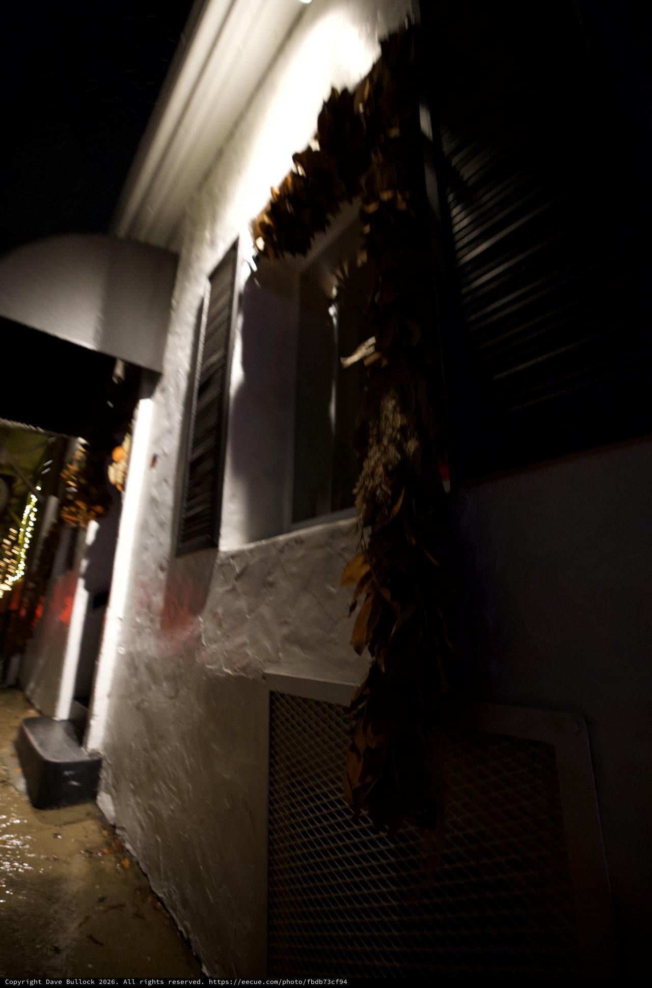 Dramatic Night View of Illuminated White Building Facade