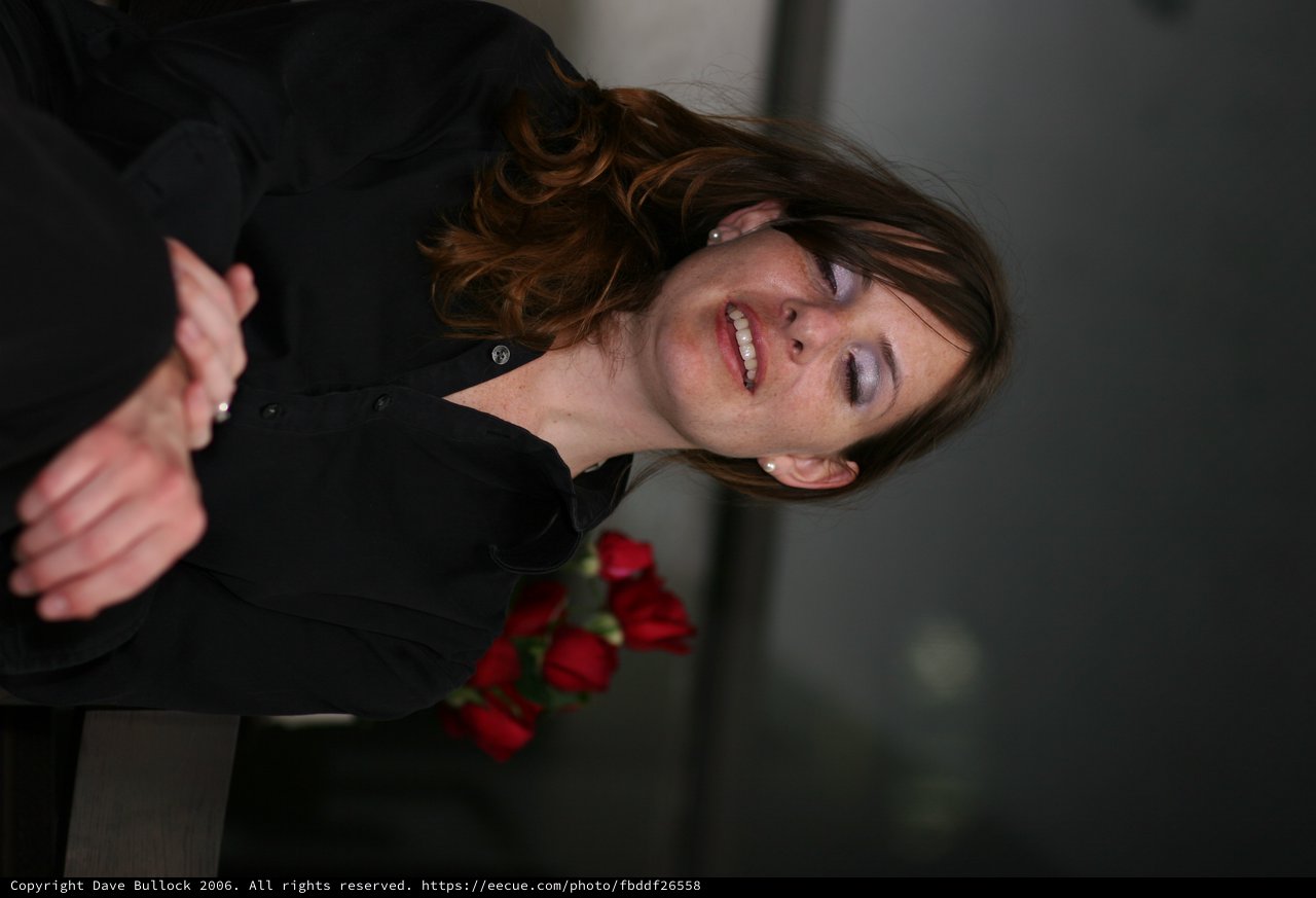 Penelope Smiling Among Red Roses Valentine's Day