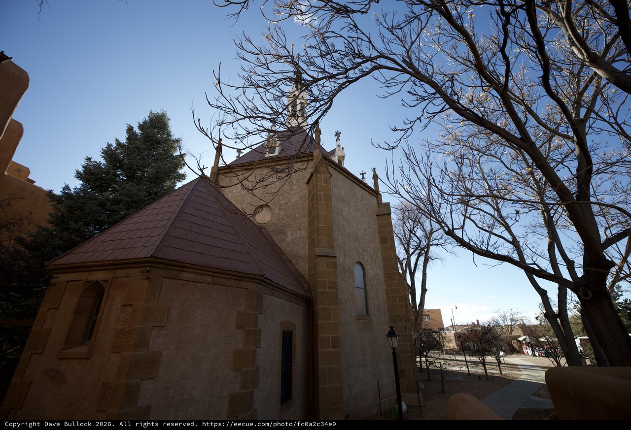 Historic Chapel with Bare Winter Trees in Santa Fe