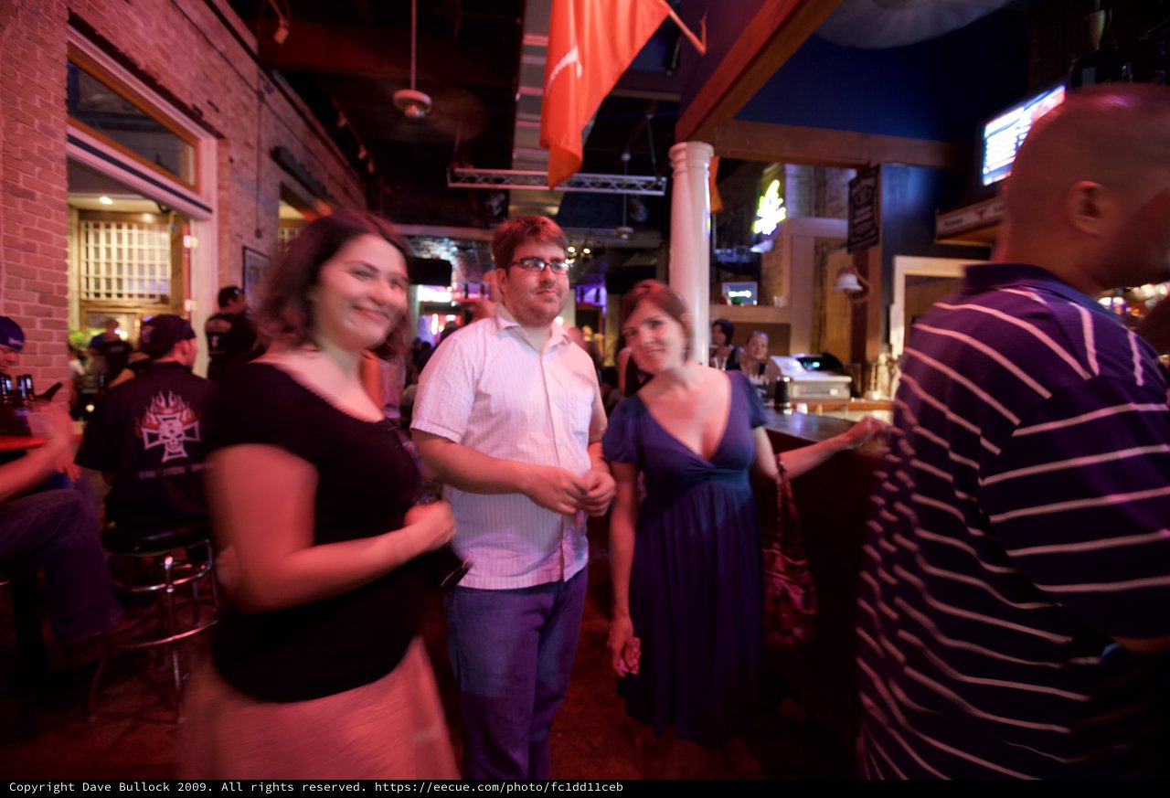Friends Socializing at a Lively Austin Bar