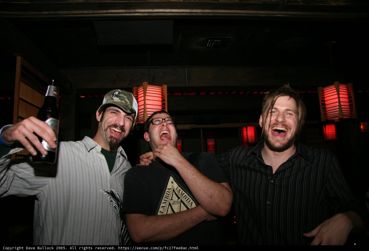 Three Men at a City Pub
