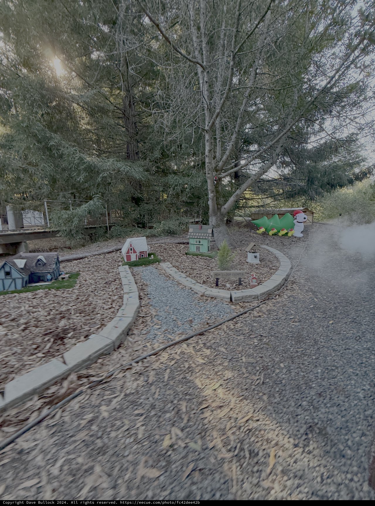 Whimsical Miniature Village Display in Park Setting
